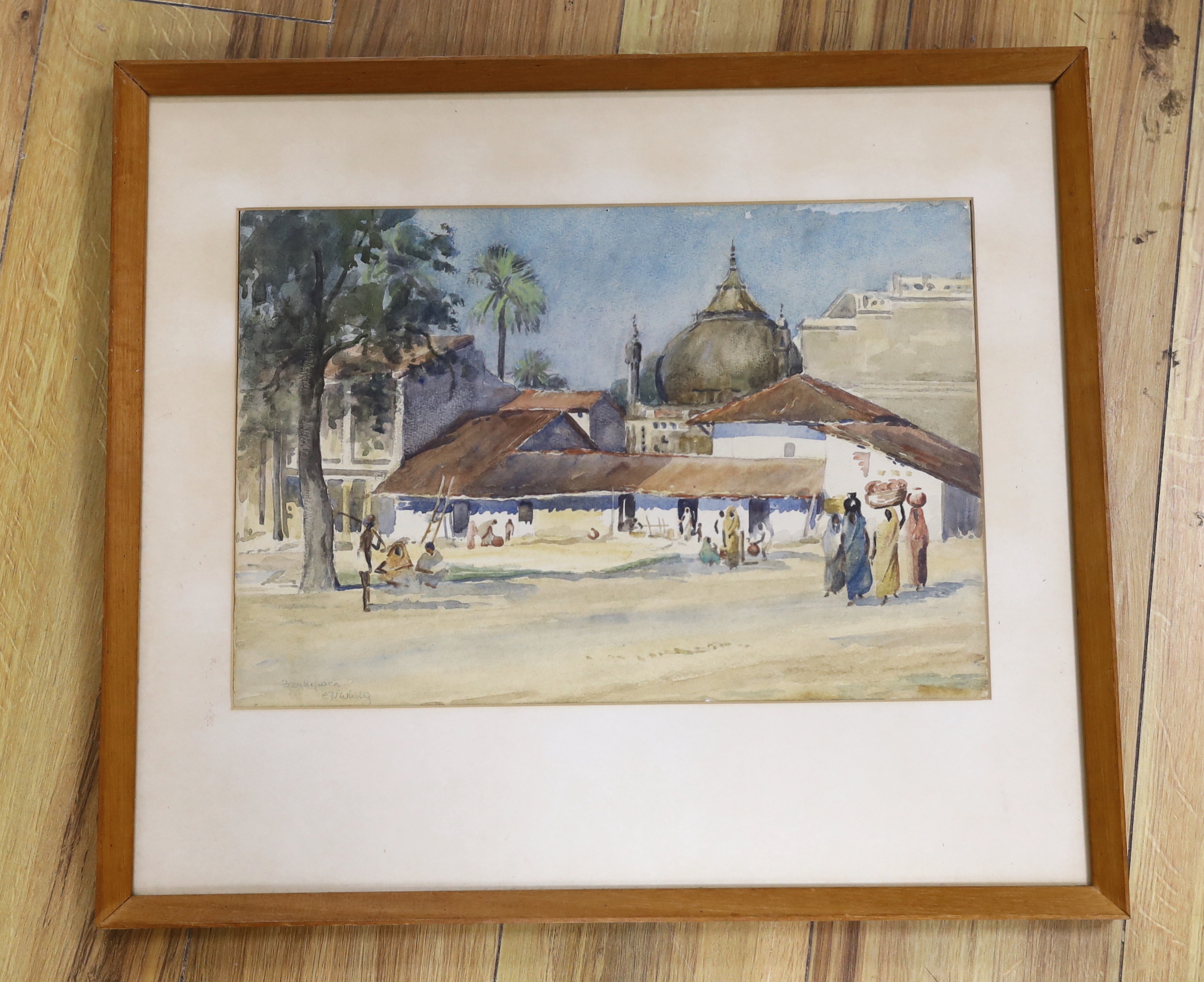 E.N. Whitty, watercolour, figures before buildings Bankapora, India, signed and inscribed, 39 x 27cm